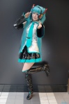 aqua_hair boots cosplay default_costume detached_sleeves hatsune_miku headset pleated_skirt skirt tie tsugihagi_mishin twintails vocaloid zettai_ryouiki rating:Safe score:0 user:nil!
