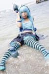 asakura_kana beach blue_hair cosplay croptop gundam msm-07_z'gok ocean pleated_skirt skirt striped tank_top thighhighs wet zettai_ryouiki rating:Safe score:1 user:nil!