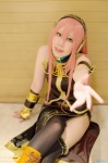 boots cosplay default_costume headset mai megurine_luka pantyhose pink_hair skirt sleeveless_blouse thighhighs vocaloid rating:Safe score:1 user:nil!