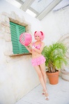 beach_ball bikini_top cosplay hair_ribbons kaname_madoka mashiro_yuki miniskirt pink_hair puella_magi_madoka_magica skirt swimsuit twintails rating:Safe score:0 user:nil!