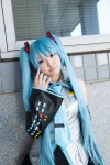aqua_hair blouse cosplay detached_sleeves hatsune_miku headset pleated_skirt skirt tie twintails vocaloid yuuya rating:Safe score:0 user:pixymisa