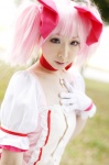 choker cosplay dress gloves hairbows kaname_madoka miiko pink_hair puella_magi_madoka_magica twintails rating:Safe score:0 user:nil!
