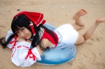 ass barefoot beach cosplay detached_sleeves hairbow hakurei_reimu lenfried miko one-piece_swimsuit swimsuit touhou rating:Safe score:2 user:nil!