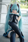 aqua_hair blouse cosplay detached_sleeves hatsune_miku headset pleated_skirt popuri skirt thighhighs tie twintails vocaloid zettai_ryouiki rating:Safe score:1 user:nil!