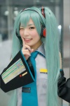 aqua_hair blouse cosplay detached_sleeves hatsune_miku headset maitako tie twintails vocaloid rating:Safe score:0 user:pixymisa