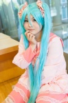 aqua_eyes aqua_hair cosplay dress hatsune_miku tiered_skirt toko_(ii) twintails vocaloid rating:Safe score:0 user:pixymisa
