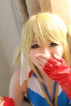 blonde_hair bodysuit cleavage cosplay fingerless_gloves gloves gundam gundam_0079_card_builder higurashi_rin reiko_holinger twintails rating:Safe score:0 user:nil!