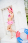 bikini_top cosplay hair_ribbons inner_tube kaname_madoka mashiro_yuki miniskirt pink_hair puella_magi_madoka_magica skirt swimsuit twintails rating:Safe score:0 user:nil!