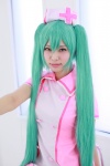 aqua_hair cosplay hatsune_miku hiiragi_haruka nurse nurse_cap nurse_uniform twintails vocaloid rating:Safe score:0 user:pixymisa