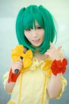 cosplay green_hair kurasaka_kururu macross macross_frontier microphone miniskirt ranka_lee skirt tank_top twintails rating:Safe score:0 user:nil!