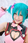aqua_hair chii cleavage cosplay dress elbow_gloves fingerless_gloves gloves hairbows hatsune_miku project_diva twintails vocaloid world_is_mine_(vocaloid) rating:Safe score:3 user:nil!