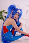 bed blue_hair bodysuit buyara cosplay hair_ribbons headband klan_klein macross macross_frontier twintails rating:Safe score:0 user:nil!