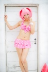 bikini_top cosplay hair_ribbons kaname_madoka mashiro_yuki miniskirt pink_hair puella_magi_madoka_magica skirt swimsuit twintails rating:Safe score:0 user:nil!