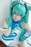 aqua_hair cosplay detached_sleeves hatsune_miku kuzui_azuki miracle_paint_(vocaloid) one-piece_swimsuit pantyhose swimsuit twintails vocaloid rating:Safe score:0 user:nil!