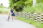 bicycle campus_lover kimura_konomi pleated_skirt polo skirt twintails rating:Safe score:0 user:nil!