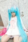 aqua_hair bow cosplay dress hatsune_miku lots_of_laugh_(vocaloid) plushie rushi twintails vocaloid rating:Safe score:1 user:pixymisa