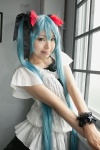 blouse cosplay green_hair hair_ribbons hatsune_miku mashiro_yuki tiered_skirt twintails vocaloid world_is_mine_(vocaloid) rating:Safe score:3 user:pixymisa