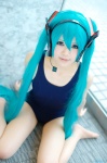 aqua_hair cosplay hatsune_miku headset one-piece_swimsuit pantyhose swimsuit twintails utateika-na vocaloid rating:Safe score:0 user:nil!