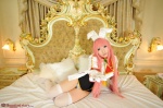 animal_ears bed bodysuit bunny_ears cosplay gloves pink_hair saku siesta45 thighhighs twintails umineko_no_naku_koro_ni rating:Safe score:0 user:nil!