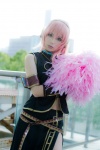 boots cosplay detached_sleeves headset megurine_luka pink_hair pom_poms skirt sleeveless_blouse vocaloid yuu rating:Safe score:2 user:nil!