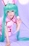 aqua_hair cosplay hatsune_miku nurse nurse_cap nurse_uniform stethoscope tachibana_sakura twintails vocaloid rating:Safe score:1 user:pixymisa