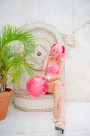 beach_ball bikini_top cleavage cosplay hair_ribbons kaname_madoka mashiro_yuki miniskirt pink_hair puella_magi_madoka_magica skirt swimsuit twintails rating:Safe score:0 user:nil!