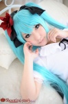 aqua_hair bed blouse cosplay hairbows hatsune_miku saku twintails vocaloid world_is_mine_(vocaloid) rating:Safe score:1 user:nil!