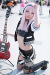 boots choker cosplay fishnet_stockings garter_straps guitar headphones jacket nakko nitro_super_sonic panties pink_hair shorts super_soniko thighhighs tubetop rating:Safe score:2 user:pixymisa