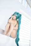 aqua_hair bikini cosplay hatsune_miku neko swimsuit tagme_song twintails vocaloid rating:Safe score:7 user:nil!