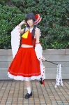 blouse cosplay detached_sleeves hairbow hakurei_reimu miko popuri skirt socks touhou rating:Safe score:0 user:nil!