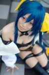 bikini blue_hair boots choker cleavage cosplay detached_sleeves dizzy guilty_gear hairbow pantyhose swimsuit tachibana_remika tail thighhighs wings rating:Safe score:0 user:nil!