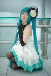 aqua_eyes aqua_hair cosplay dress elbow_gloves flower gloves hatsune_miku headdress just_a_game_(vocaloid) maropapi necklace petticoat thighhighs tiered_skirt twintails vocaloid rating:Safe score:1 user:pixymisa