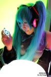 aqua_hair blouse chihane cosplay detached_sleeves hatsune_miku headset twintails vocaloid rating:Safe score:1 user:nil!
