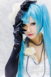 aqua_eyes aqua_hair cleavage cosplay dress elbow_gloves flower gloves hat hatsune_miku necklace rau_(cosplayer) twintails vocaloid rating:Safe score:2 user:pixymisa