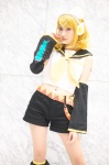 blonde_hair blouse cosplay detached_sleeves hairbow headset hiokichi kagamine_rin leggings scarf shorts vocaloid rating:Safe score:0 user:pixymisa