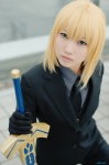 ahoge blazer blonde_hair cosplay fate/series fate/zero gloves ponytail saber sword trousers yuuri_(shio274) rating:Safe score:0 user:nil!