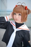 antenna_hair blouse cardcaptor_sakura cosplay karin_(iv) kinomoto_sakura sailor_uniform scarf_tie school_uniform twintails rating:Safe score:1 user:pixymisa