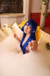 bathroom bathtub blue_hair cleavage cosplay dizzy guilty_gear hairbows hitori_gokko saku soap_suds wet rating:Safe score:0 user:nil!