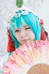 aqua_eyes cosplay fan hatsune_miku hood maitako multi-colored_hair robe tassels vocaloid rating:Safe score:1 user:pixymisa