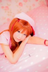 bed cosplay dress mashiro_yuki neon_genesis_evangelion nurse nurse_cap nurse_uniform red_hair soryu_asuka_langley stethoscope twintails rating:Safe score:0 user:nil!