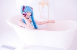 aqua_hair bathroom bathtub bikini cosplay hatsune_miku headset mashiro_yuki project_diva swimsuit twintails vocaloid rating:Safe score:0 user:nil!