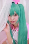 aqua_hair cosplay hatsune_miku hiiragi_haruka nurse nurse_cap nurse_uniform stethoscope twintails vocaloid rating:Safe score:0 user:pixymisa