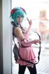 aqua_hair cosplay dress elbow_gloves fingerless_gloves gloves hatsune_miku headset leggings project_diva ryuga tail vocaloid wings world_is_mine_(vocaloid) rating:Safe score:2 user:nil!