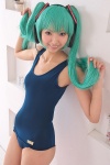 aqua_hair cosplay hatsune_miku headset necoco necosmo one-piece_swimsuit swimsuit twintails vocaloid rating:Safe score:1 user:nil!