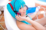 aqua_hair bikini_top cosplay hatsune_miku headset mashiro_yuki pool project_diva swimsuit twintails vocaloid rating:Safe score:0 user:nil!