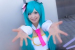 aqua_hair cheerleader_uniform collar cosplay detached_sleeves hair_ribbons hatsune_miku mogu sing_and_smile_(vocaloid) tie tubetop twintails vocaloid rating:Safe score:0 user:pixymisa