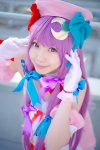 amatsuka_miyu bows bowtie cosplay dress gloves hairbows hat patchouli_knowledge purple_eyes purple_hair touhou twintails rating:Safe score:0 user:pixymisa