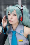 aqua_hair blouse cosplay detached_sleeves hatsune_miku headset maitako tie twintails vocaloid rating:Safe score:1 user:pixymisa
