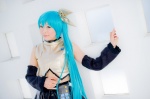 aqua_hair cosplay croptop detached_sleeves hairbow hatsune_miku mashiro_yuki pleated_skirt ponytail project_diva skirt vocaloid rating:Safe score:0 user:nil!