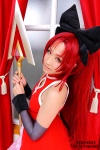 cosplay detached_sleeves dress hairbow kobayakawa_saiko puella_magi_madoka_magica red_hair sakura_kyouko spear rating:Safe score:0 user:nil!